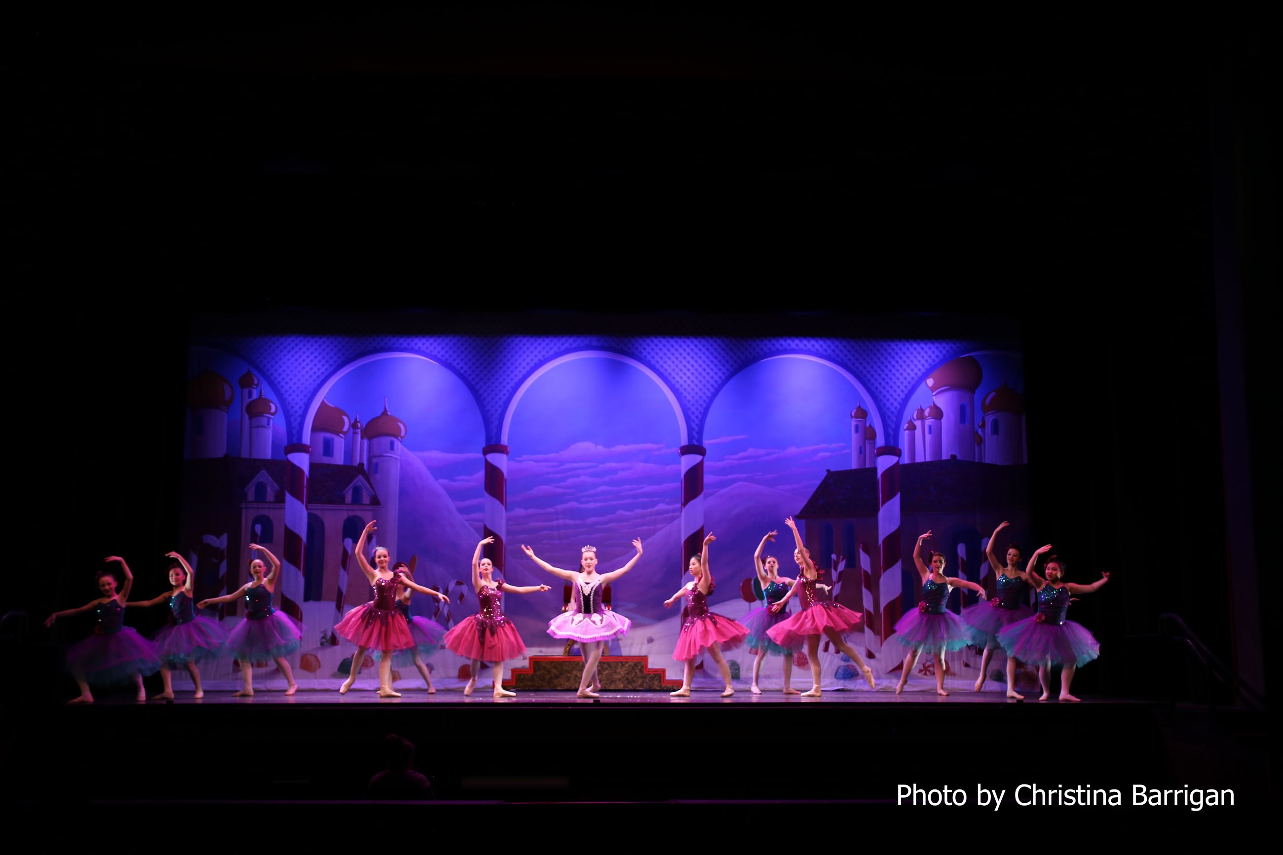 Clara in The Nutcracker dances with other ballerinas, photo by Christina Barrigan